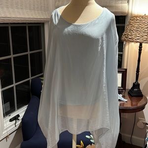 Light gauze blue overlay top size medium to large. Bought in Greece.